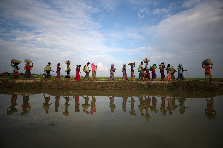 Image: Rohingya refugees after crossing from Myanmar into Palang Khali, near Cox's Bazar