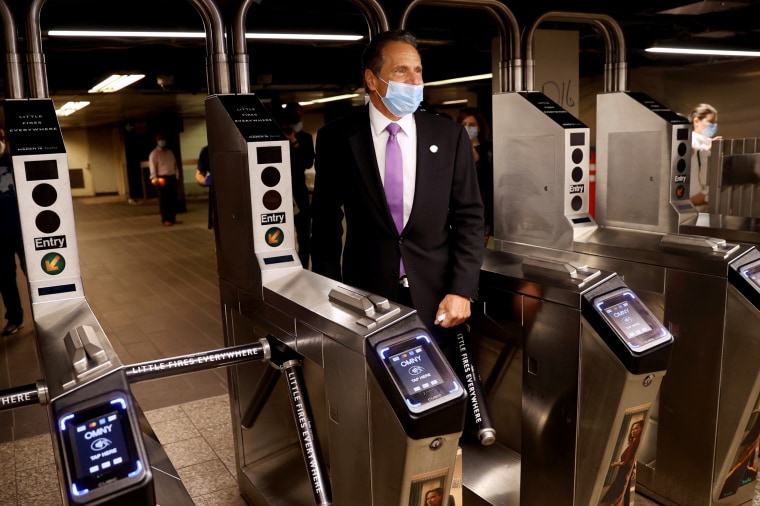 Image: New York Governor Andrew Cuomo exits a subway station after riding in Manhattan on June 8, 2020.