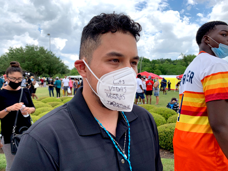 Joey Lucio Sanjavier, a 26-year-old son of Mexican immigrants, had taken a black marker and written "las vidas negras importan" across the front of his face mask - black lives matter. "I feel like, as a Latino, I have to be here," Lucio Sanjavier said, while waiting in line to view Floyd's golden casket. "If we're not here to support our black community, how are we going to stand up for our own rights?"