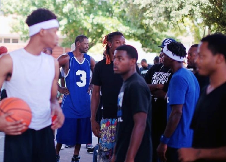 IMAGE: George Floyd ministers to young men