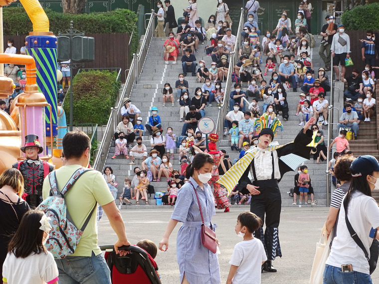 Image: A performer entertains crowds at Everland amusement park in South Korea.