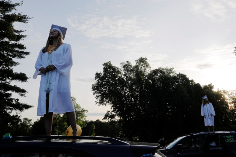 Image: High school graduation is held at a drive-in theater due to the outbreak of the coronavirus disease (COVID-19) in Hinsdale