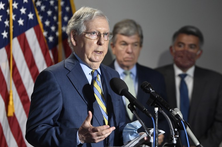 Image: Senate Majority Leader Mitch McConnell of Ky., left, speaks to reporters following the weekly Republican policy luncheon on Capitol Hill in Washington, Tuesday, June 9, 2020. Sen. Roy Blunt, R-Mo., center, and Sen. Cory Gardner, R-Colo., right, lis