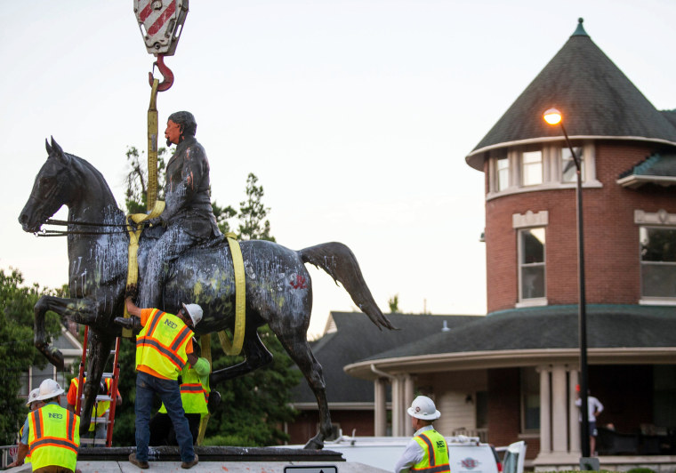 Image: The John B. Castleman statue is prepared for its removal from the pedestal in Louisville