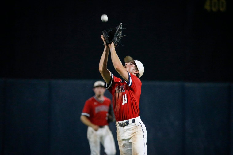 Urbandale senior right fielder Brook Heinen catches a fly ball in the seventh inning against Johnston in the Iowa Class 4A state baseball championship game at Principal Park in Des Moines, Iowa, on Aug. 3, 2019.