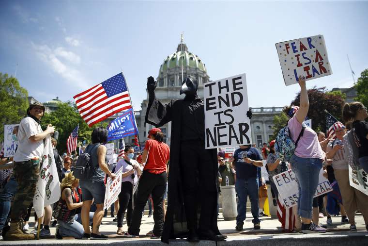 Image: Protesters demonstrate during a rally against Pennsylvania's coronavirus stay-at-home order at the state Capitol in Harrisburg, Pa
