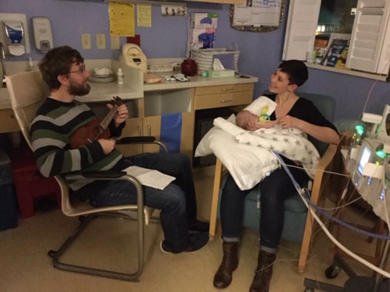 Aaron Dohogne learned how to play ukulele to bond with his son, John, who has been in the neonatal intensive care unit for almost a year. He says even nurses smile when they hear him playing a song they like. 