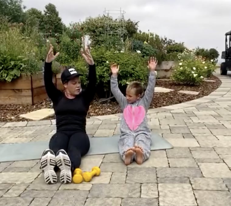 Pink's kids adorably crash her virtual workout session