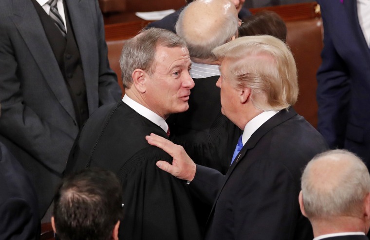 U.S. President Trump greets Justice Roberts after delivering his State of the Union address in Washington