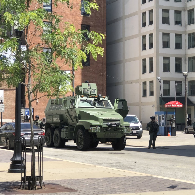 Image: A National Guard military tank on corner near a protest in Cincinnati, Ohio
