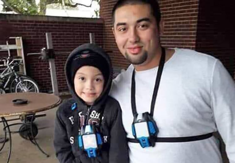 Nicolas Chavez with his son.