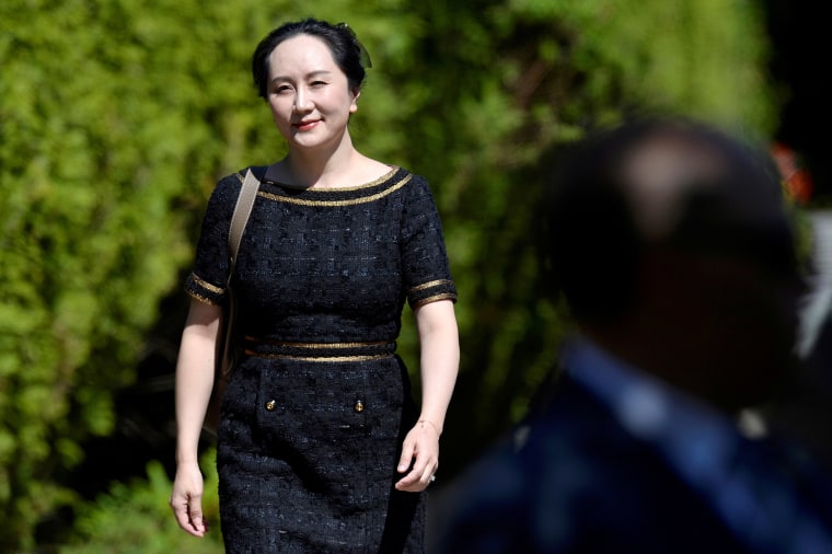 Image: Huawei Technologies Chief Financial Officer Meng Wanzhou leaves her home to attend a court hearing in Vancouver, British Columbia