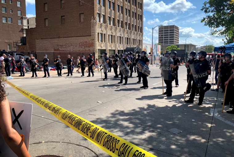 Image: Police form a line outside of the BOK Center before a rally hosted by President Donald Trump in Tulsa, Okla., on June 20, 2020.