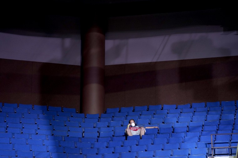 Image: A supporter sits in the stands at a campaign rally for President Donald Trump in Tulsa, Okla., on June 20, 2020.