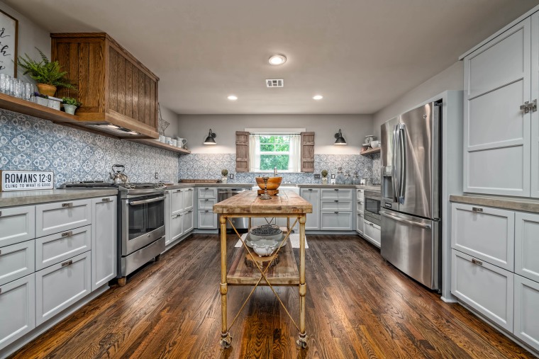 The cottage's kitchen offers plenty of room to prep and cook meals.