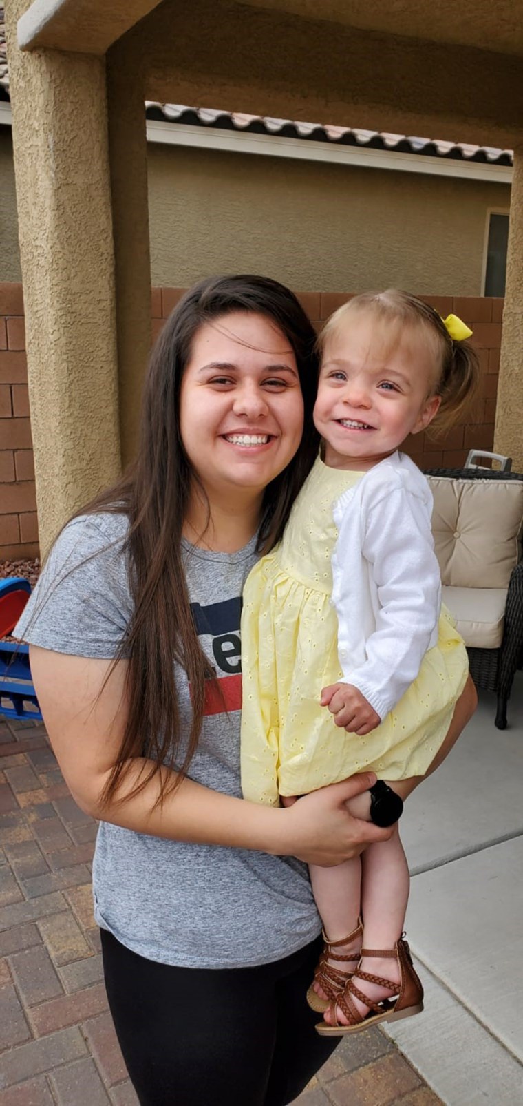 Angela Babb's daughter, Vanessa, 2, is cared for by Giovana Garcia, an au pair from Brazil.