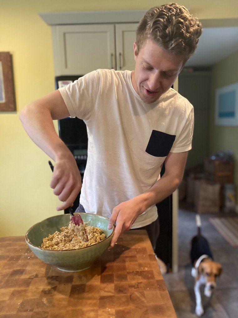 The writer's brother taking some frustration out on his cookie dough.