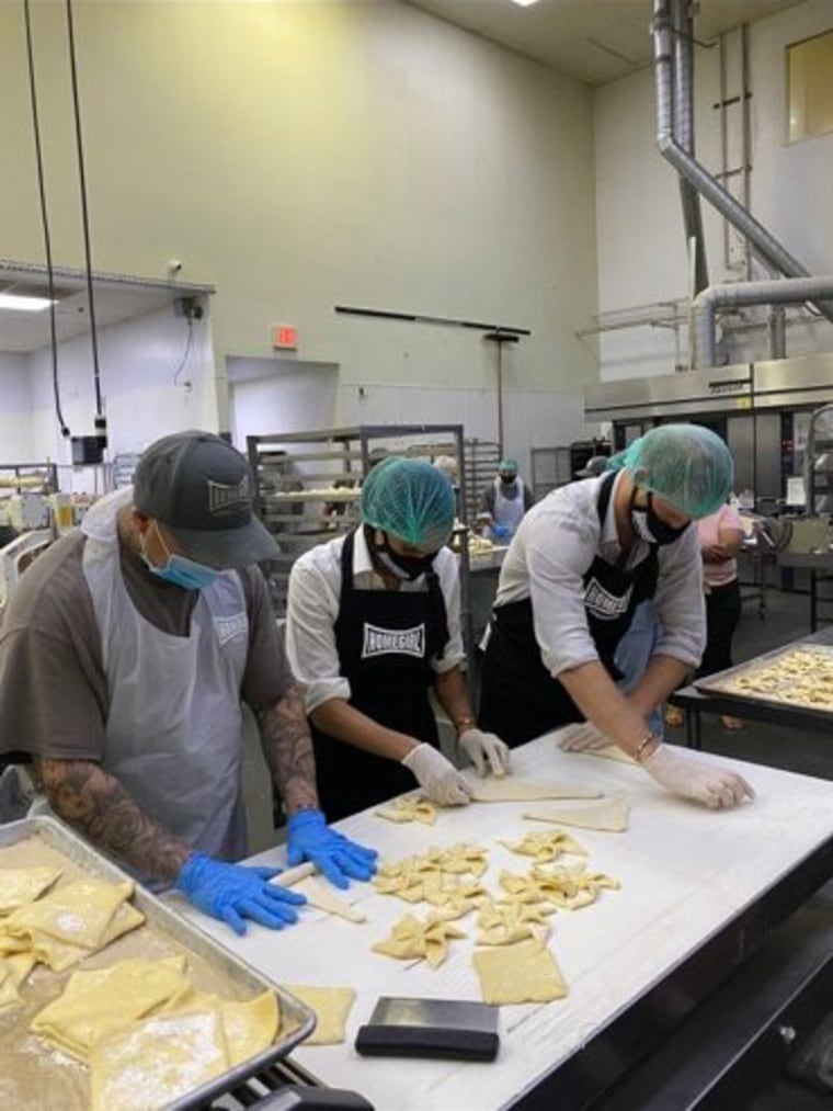 They helped prepare food during their visit.