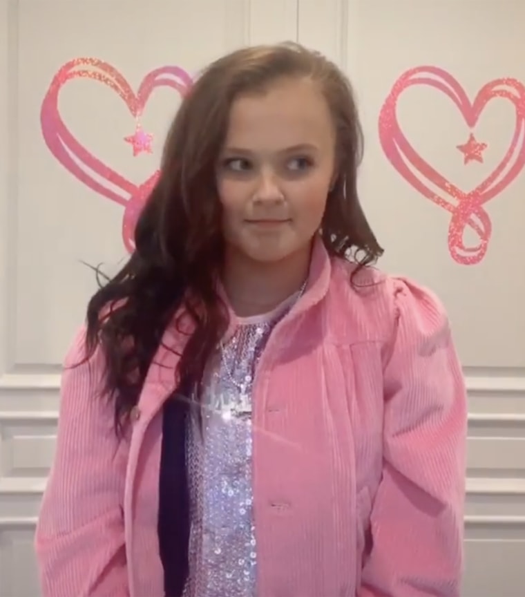 JoJo Siwa trades signature blond ponytail for long brunette hair