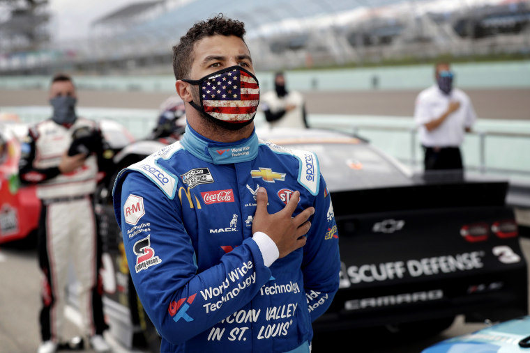 Image: Bubba Wallace stands for the national anthem before a race at Homestead-Miami Speedway in Florida on June 14, 2020.