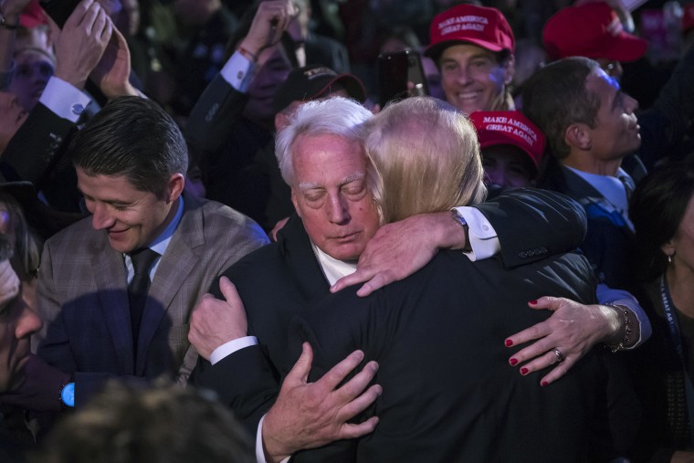 Image: Robert Trump and Donald Trump hug