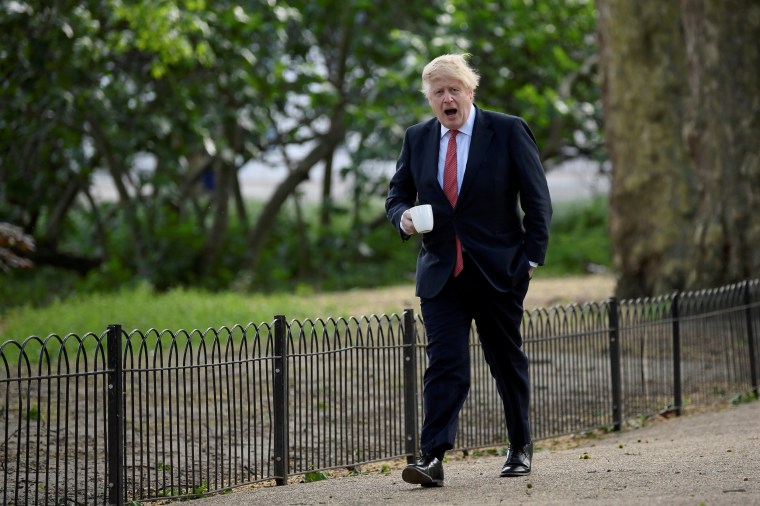 British Prime Minister Boris Johnson goes for a walk in Central London on May 11, 2020.