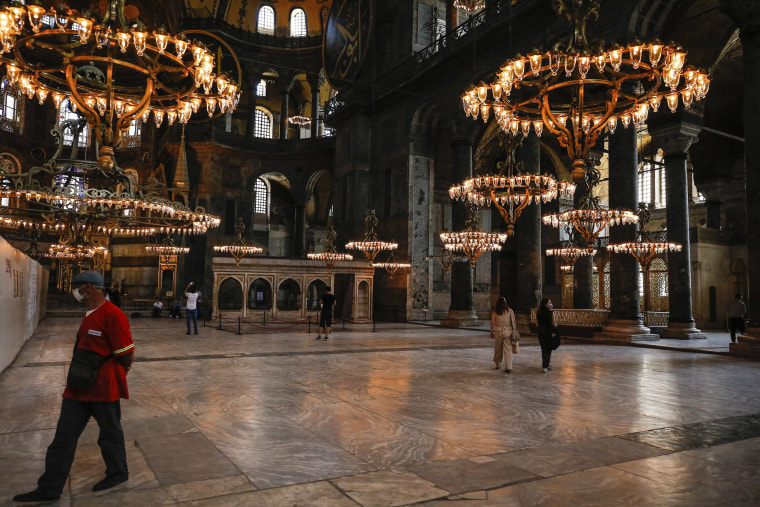 Image: People visit the Byzantine-era Hagia Sophia, one of Istanbul's main tourist attractions in the historic Sultanahmet district of Istanbul