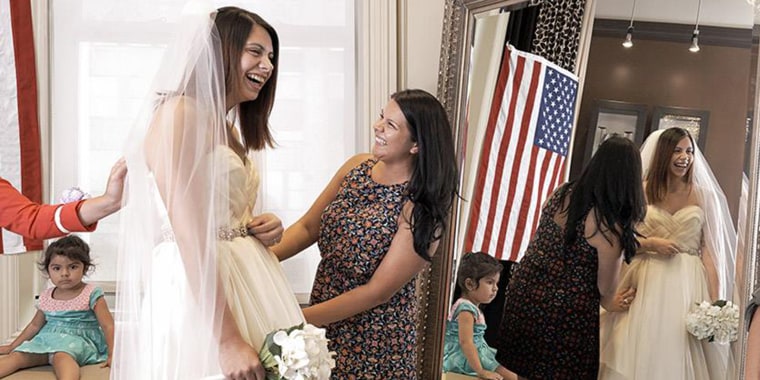 A bride says yes to the dress at a Brides Across America event in Chicago in 2018.