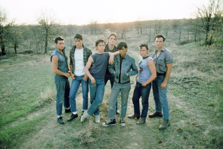 THE OUTSIDERS, from left: Tom Cruise, Rob Lowe, C. Thomas Howell, Matt Dillon (rear), Ralph Macchio,