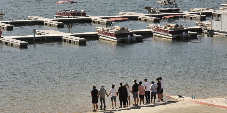Cast members from the show "Glee" and friends gathered Monday morning at the boat launch as Ventura County Sheriff's Search and Rescue dive team located a body Monday morning in Lake Piru as the search continued for actress Naya Rivera after her 4-year-ol