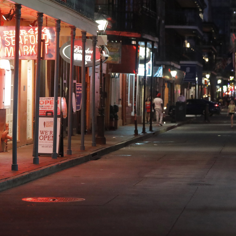 A deserted stretch of Bourbon Street in the French Quarter of New Orleans is seen Tuesday, July 14, 2020. 