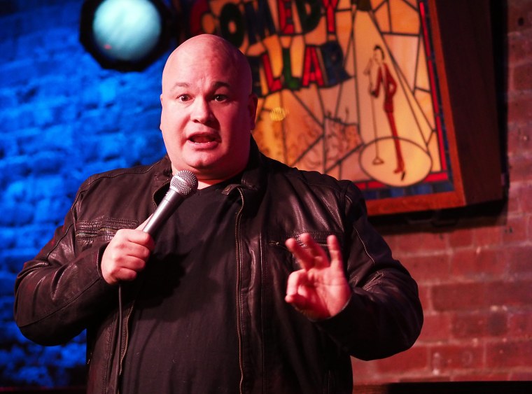 Comedian Robert Kelly performs at the Comedy Cellar