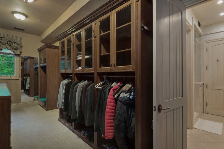 The walk-in closet has plenty of space for any wardrobe.