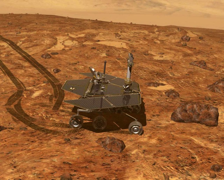 Image: Controlling the rover from Earth, scientists drive the rover along Mars' surface inspecting geological features.
