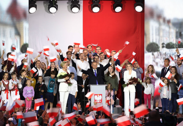 Image: Polish President Andrzej Duda, a conservative who ran a campaign with homophobic and anti-Semitic overtones, celebrates initial election results in Pultusk, Poland