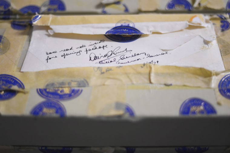 Image: A broken seal is seen on a box containing letters between former Australian Governor-General Sir John Kerr and Buckingham Palace during the Kerr Palace Letters release event in Canberra, Australia