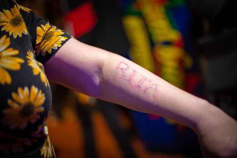 Image: Kate Noonan's arm reads 'Rita.'