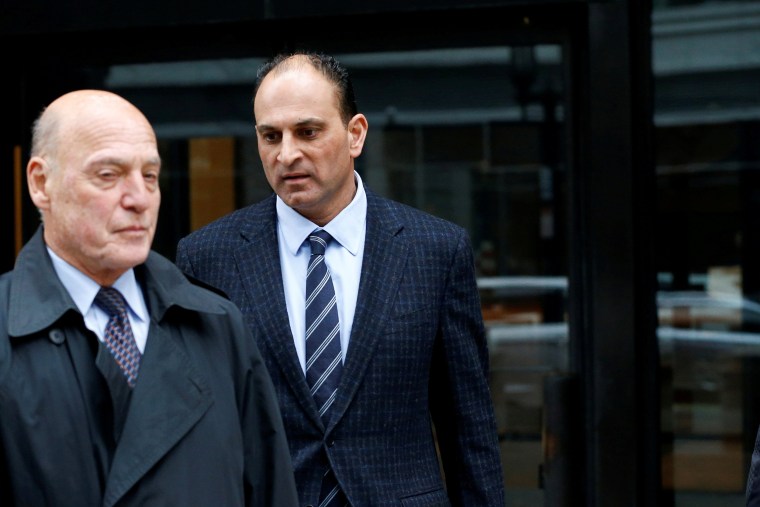 Image: David Sidoo, a Vancouver businessman and former Canadian Football League player, leaves the federal courthouse