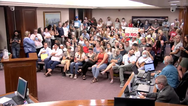 Residents without masks attend a meeting about masks in Utah County, Utah, on July 15, 2020.