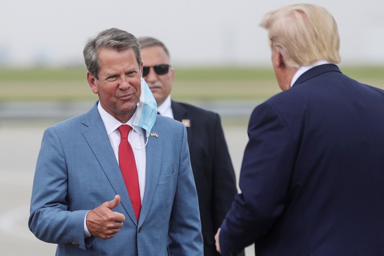 Image: Georgia Gov. Brian Kemp greets President Donald Trump in Atlanta