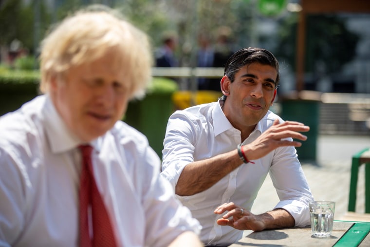 Image: Britain's Prime Minister Boris Johnson and Chancellor Rishi Sunak visit Pizza Pilgrims in West India Quay, in London