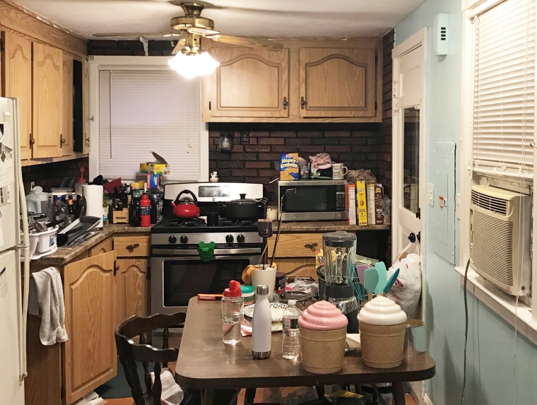 Our old kitchen was cramped and looked visually smaller with its dark brick backsplash.