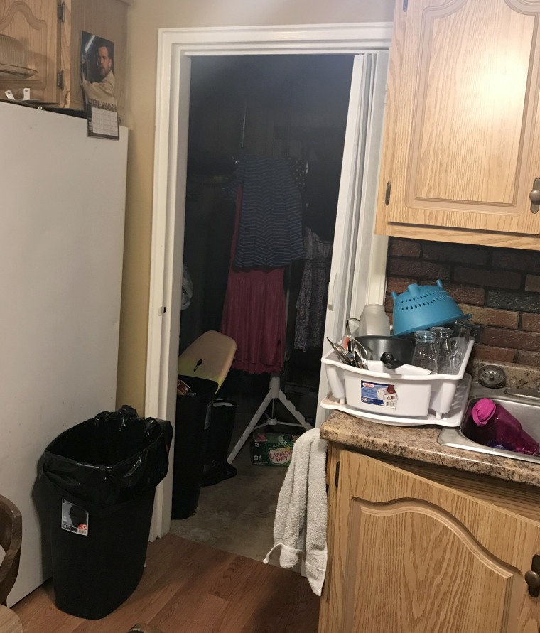 Our old kitchen was divided right down the middle with this doorway into the laundry room. It made the space feel much smaller than it already was!
