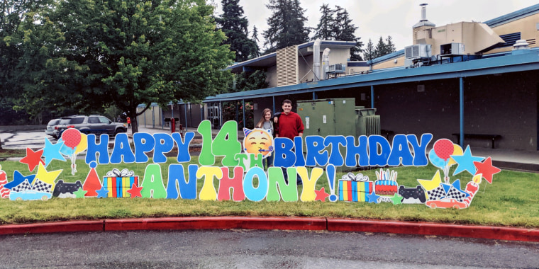 Anthony and a friend at his birthday car parade.