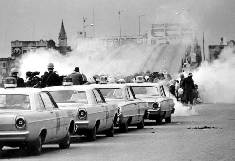 Image: Tear gas fumes fill the air as state troopers, ordered by Gov. George Wallace, break up a demonstration march in Selma, Alabama