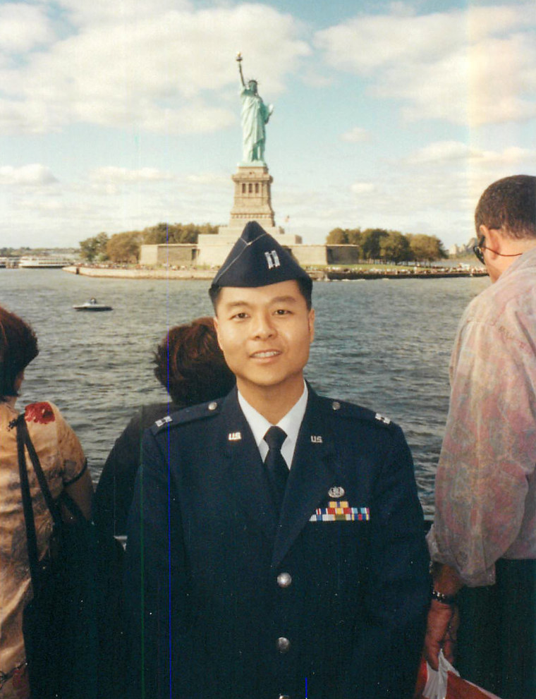 Image: Ted Lieu in uniform near the Statue of Liberty