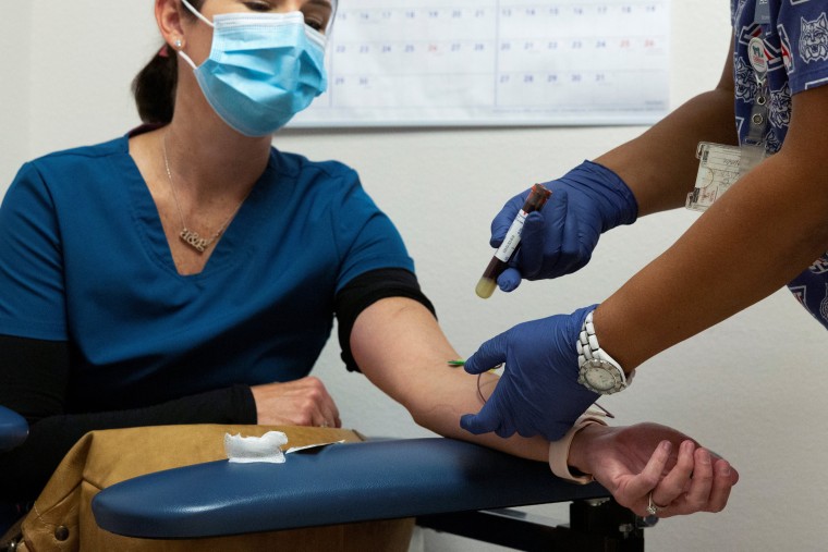 A blood sample is articulated after being drawn for an antibody test for the coronavirus disease at the University of Arizona in Tucson, Ariz., on July 10, 2020.