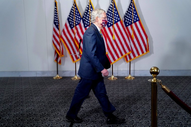 Image: Senate Majority Leader McConnell arrives to a luncheon on Capitol Hill in Washington