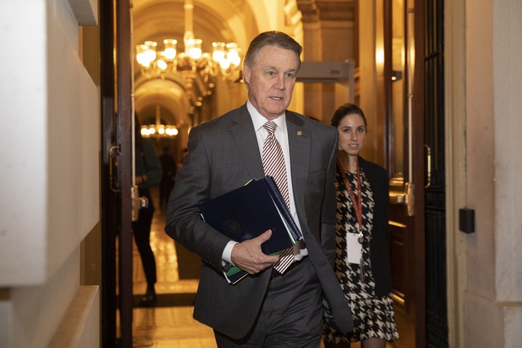 Sen. David Perdue, R-Ga., leaves Capitol Hill on Jan. 31, 2020.