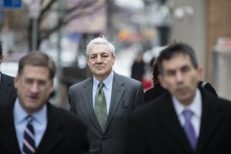 Former Penn State president Graham Spanier walks to the courthouse in Harrisburg, Pa., on March 24, 2017.